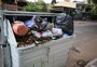 Porto Alegre volta a ter atraso na coleta automatizada de lixo e contêineres estão lotados