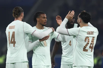 France's forward #11 Michael Olise (2L) celebrates scoring his team's third goal with France's midfielder #14 Adrien Rabiot (L) and France's defender #04 Dayot Upamecano and France's forward #24 Rayan Cherki (R) during the international friendly football match between France and North Ireland at the Decathlon Arena - Pierre Mauroy stadium in Villeneuve-d'Ascq, northern France on June 8, 2026, ahead of the 2026 FIFA World Cup football tournament.<!-- NICAID(16302220) -->