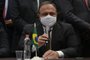 Brazil's Health Minister Eduardo Pazuello offers a press conference at the distribution centre of the health ministry as doses of the Chinese CoronaVac vaccine start being distributed across the country amid the novel coronavirus, COVID-19, pandemic, in Guarulhos, Sao Paulo, Brazil, on January 18, 2021. - The global Covid-19 vaccination drive gained pace Sunday as Brazil gave its first injections. Brazil's health regulator gave the green light for the Oxford-AstraZeneca vaccine and China's CoronaVac to be used as the Latin American giant suffers a devastating second wave of the coronavirus. (Photo by Miguel SCHINCARIOL / AFP)Editoria: HTHLocal: Sao PauloIndexador: MIGUEL SCHINCARIOLSecao: diseaseFonte: AFPFotógrafo: STR<!-- NICAID(14693092) -->