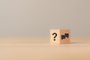 Q and A concept. Q and A symbols on wooden cube block on a grey background. Illustration for frequently asked questions concepts in websites, social networks, business issues. Recommendation concept.Fonte: 621221476<!-- NICAID(15622238) -->