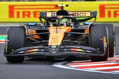 McLaren's British driver Lando Norris steers his car during the first practice session ahead of the Formula One Hungarian Grand Prix at the Hungaroring circuit at Mogyorod village, east from the capital Budapest, on August 1, 2025. (Photo by Ferenc ISZA / AFP)<!-- NICAID(16092621) -->