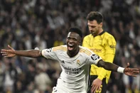 Real Madrid's Brazilian forward #07 Vinicius Junior celebrates scoring his team's second goal during the UEFA Champions League final football match between Borussia Dortmund and Real Madrid, at Wembley stadium, in London, on June 1, 2024. (Photo by INA FASSBENDER / AFP)Editoria: SPOLocal: LondonIndexador: INA FASSBENDERSecao: soccerFonte: AFPFotógrafo: STR<!-- NICAID(15778626) -->