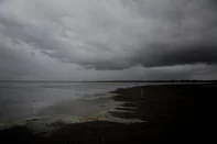 Tavares, RS, Brasil, 11-03-2022: Chegada de frente fria com chuva e vento sul levam água para a Lagoa do Peixe, que sofre com o período de seca. (Foto: Mateus Bruxel / Agência RBS)Indexador: Mateus Bruxel<!-- NICAID(15039016) -->