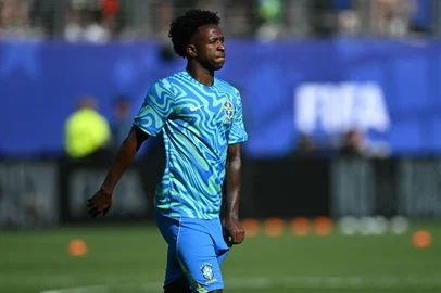 Brazil's forward #07 Vinicius Junior walks during a warm up ahead of the 2026 World Cup Group C football match between Brazil and Morocco at the New York/New Jersey Stadium in East Rutherford on June 13, 2026. (Photo by Mauro PIMENTEL / AFP)<!-- NICAID(16305794) -->