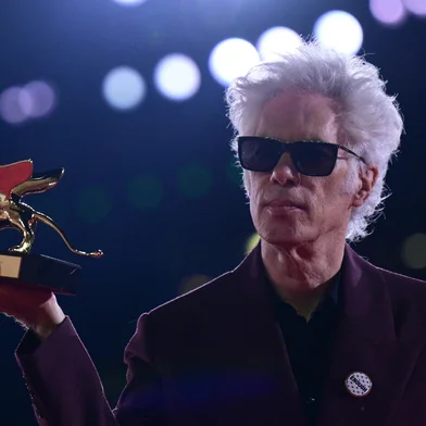 US director Jim Jarmusch poses with the Golden Lion for Best Film he reveived for 'Father Mother Sister Brother' after the award ceremony of the 82nd Venice Film Festival on September 6, 2025 at Venice Lido. (Photo by Tiziana FABI / AFP)<!-- NICAID(16118689) -->