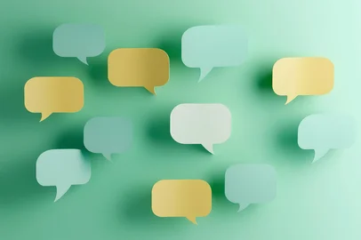 A collection of floating speech bubbles, indicating communication and conversation.<!-- NICAID(15995986) -->