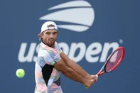 NEW YORK, NEW YORK - AUGUST 24: Tomas Machac of Czech Republic returns against Luca Nardi of Italy during their Men's Singles First Round match on Day One of the 2025 US Open at USTA Billie Jean King National Tennis Center on August 24, 2025 in the Flushing neighborhood of the Queens borough of New York City.   Al Bello/Getty Images/AFP (Photo by AL BELLO / GETTY IMAGES NORTH AMERICA / Getty Images via AFP)<!-- NICAID(16110347) -->