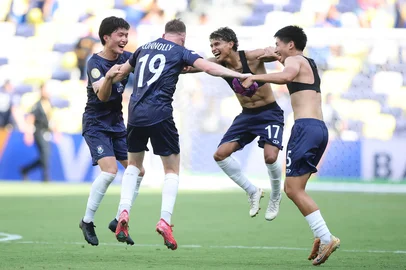 NASHVILLE, TENNESSEE - JUNE 24: Joe Lee #16, Dylan Connolly #19, Jerson Lagos #17, and Jeremy Foo #15 of Auckland City FC celebrate following the FIFA Club World Cup 2025 group C match between Auckland City FC and CA Boca Juniors at GEODIS Park on June 24, 2025 in Nashville, Tennessee.   Alex Grimm/Getty Images/AFP (Photo by ALEX GRIMM / GETTY IMAGES NORTH AMERICA / Getty Images via AFP)<!-- NICAID(16066754) -->