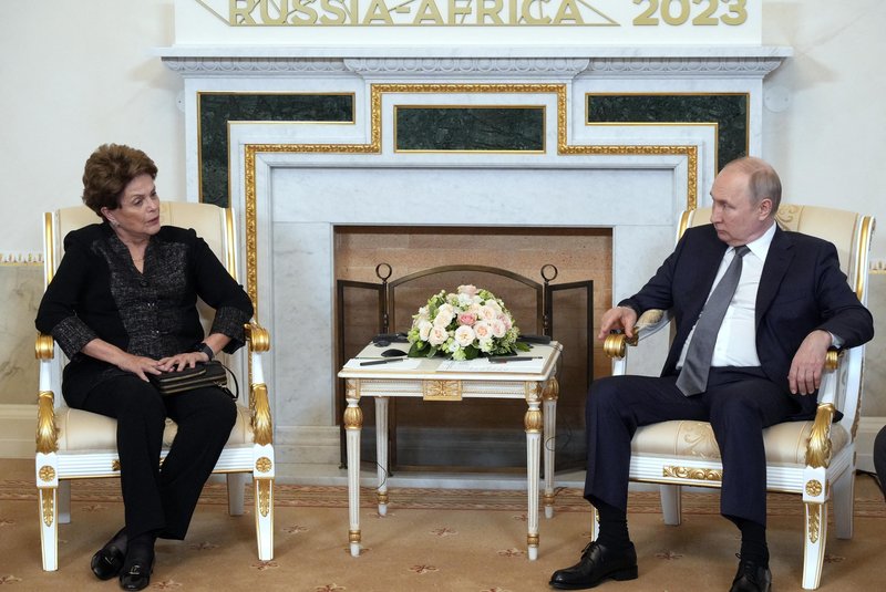 Russian President Vladimir Putin meets with Dilma Rousseff, Chair of the New Development Bank, in Strel'na, outside Saint Petersburg, on July 26, 2023, ahead of the second Russia-Africa summit. (Photo by Alexey DANICHEV / SPUTNIK / AFP)<!-- NICAID(15492708) -->