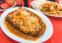 Para compartilhar com a família: descubra o restaurante da Capital conhecido pelo farto filé à parmegiana 
