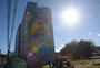 Grafite na lateral de prédio dá mais cor ao bairro Lourdes, em Caxias