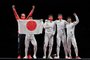Japan's fencer team and their Ukrainian coach Alexander Gorbachuk (L) celebrate after winning against Russia's in the men's epee team gold medal bout during the Tokyo 2020 Olympic Games at the Makuhari Messe Hall in Chiba City, Chiba Prefecture, Japan, on July 30, 2021. (Photo by Fabrice COFFRINI / AFP)<!-- NICAID(14849303) -->