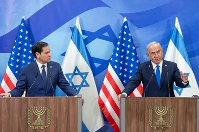US Secretary of State Marco Rubio (L) and Israeli Prime Minister Benjamin Netanyahu make a joint statement to the media at the prime minister's office in Jerusalem on February 16, 2025. Rubio said Palestinian militant group Hamas "must be eliminated", after meeting on February 16 with Israel's prime minister. (Photo by Ohad Zwigenberg / POOL / AFP)<!-- NICAID(15977661) -->