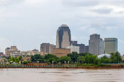 Shreveport, city in the state of Louisiana, United States, as seen across the Red River, during overcast and rain<!-- NICAID(16268991) -->