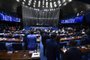 Plenário do Senado Federal durante sessão deliberativa ordinária.Na pauta, a proposta de emenda à Constituição (PEC 45/2019) que institui uma reforma no sistema tributário brasileiro.Geral do plenário.À tribuna, em discurso, senador Carlos Portinho (PL-RJ).Mesa:senador Efraim Filho (União-PB);presidente do Senado Federal, senador Rodrigo Pacheco (PSD-MG).Foto: Jefferson Rudy/Agência Senado<!-- NICAID(15591710) -->
