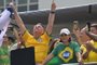 Former Brazilian President Jair Bolsonaro (2019-2022) gestures during a rally in Sao Paulo, Brazil, on February 25, 2024, to reject claims he plotted a coup with allies to remain in power after his failed 2022 reelection bid. Investigators say the far-right ex-army captain led a plot to falsely discredit the Brazilian election system and prevent the winner of the vote, leftist President Luiz Inacio Lula da Silva, from taking power. A week after Lula took office on January 1, 2023, thousands of Bolsonaro supporters stormed the presidential palace, Congress and Supreme Court, urging the military to intervene to overturn what they called a stolen election. (Photo by NELSON ALMEIDA / AFP)<!-- NICAID(15689171) -->