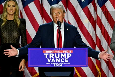 Former US President and Republican presidential candidate Donald Trump speaks during an election night event at the West Palm Beach Convention Center in West Palm Beach, Florida, on November 6, 2024. Donald Trump claimed victory and pledged to "heal" the country on November 6, 2024 as results put him on the verge of beating Kamala Harris in a stunning White House comeback. (Photo by Jim WATSON / AFP)<!-- NICAID(15908057) -->