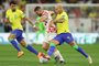 Croatia's midfielder #08 Mateo Kovacic (C) fights for the ball with Brazil's midfielder #07 Lucas Paqueta (L) and Brazil's forward #09 Richarlison during the Qatar 2022 World Cup quarter-final football match between Croatia and Brazil at Education City Stadium in Al-Rayyan, west of Doha, on December 9, 2022. (Photo by Adrian DENNIS / AFP)Editoria: SPOLocal: DohaIndexador: ADRIAN DENNISSecao: soccerFonte: AFPFotógrafo: STF<!-- NICAID(15290809) -->