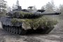Picture taken on May 4, 2022 shows a Leopard battle tank of the Armoured Brigade during the Arrow 22 exercise at the Niinisalo garrison in Kankaanpää, western Finland. - Finnish President Sauli Niinisto and Prime Minister Sanna Marin on May 12, 2022 expressed their support for NATO membership. "NATO membership would strengthen Finland's security. As a member of NATO, Finland would strengthen the entire defence alliance. Finland must apply for NATO membership without delay," they said in a joint statement. (Photo by Heikki Saukkomaa / Lehtikuva / AFP) / Finland OUT<!-- NICAID(15096062) -->