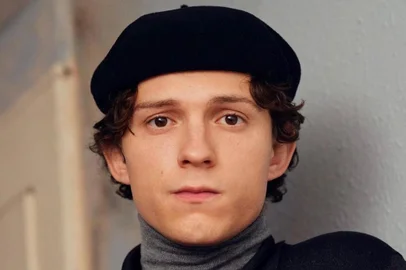 Tom Holland atua como Peter Parker na saga de filmes Homem-Aranha.<!-- NICAID(14975498) -->