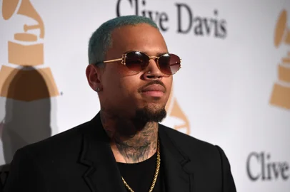 (FILES) In this file photo taken on February 7, 2015 US rapper Chris Brown attends the Pre-GRAMMY Gala at The Beverly Hilton Hotel in Beverly Hills, California. - US rapper Chris Brown is detained in Paris after a rape claim, security sources told on January 22, 2019. (Photo by Jason Merritt / GETTY IMAGES NORTH AMERICA / AFP)<!-- NICAID(13925743) -->