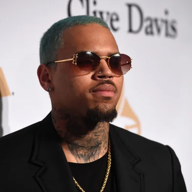 (FILES) In this file photo taken on February 7, 2015 US rapper Chris Brown attends the Pre-GRAMMY Gala at The Beverly Hilton Hotel in Beverly Hills, California. - US rapper Chris Brown is detained in Paris after a rape claim, security sources told on January 22, 2019. (Photo by Jason Merritt / GETTY IMAGES NORTH AMERICA / AFP)<!-- NICAID(13925743) -->