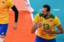 (L-R) Brazil's Ricardo Souza, Wallace de Souza, Bruno Rezende and Mauricio de Souza react after a point in the men's preliminary round pool B volleyball match between Brazil and USA during the Tokyo 2020 Olympic Games at Ariake Arena in Tokyo on July 30, 2021. (Photo by ANGELA WEISS / AFP)<!-- NICAID(14849262) -->