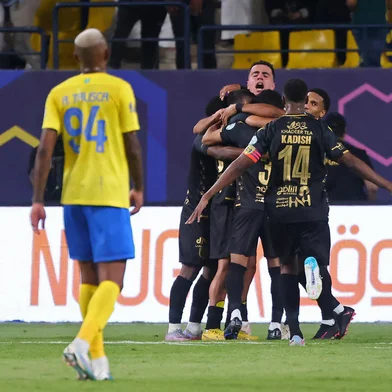 Taawoun's players celebrate their second goal during the Saudi Pro League football match between Al-Nassr and Al-Taawoun at King Saud University Stadium in Riyadh on August 18, 2023. (Photo by Fayez NURELDINE / AFP)<!-- NICAID(15514783) -->