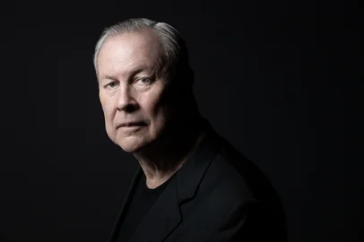 (FILES) US theater director and visual artist Robert 'Bob' Wilson poses during a photo session in Paris on September 1, 2021. Celebrated theater auteur Robert Wilson, who revolutionized stage and opera, died on July 31, 2025, at the age of 83 after a short illness, his management said. "Robert Wilson died peacefully today in Water Mill, New York, at the age of 83, after a brief but acute illness," said a statement issued on his website. (Photo by JOEL SAGET / AFP)<!-- NICAID(16092469) -->