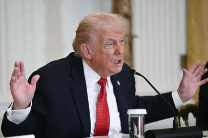 US President Donald Trump speaks during a roundtable discussion on rural health care investments in the East Room of the White House in Washington, DC on January 16, 2026. (Photo by Brendan SMIALOWSKI / AFP)<!-- NICAID(16205341) -->