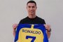 A handout picture released by Saudi Arabia's al-Nasr football club shows Portugal's forward Cristiano Ronaldo posing with the club's number seven jersey in Madrid on December 30, 2022 upon signing for the Saudi Arabian club. - Cristiano Ronaldo on December 30 signed for al-Nasr of Saudi Arabia, the club announced, in a deal believed to be worth more than 200 million euros. The 37-year-old penned a contract which will take him to June 2025. (Photo by Al Nassr Football Club / AFP) / == RESTRICTED TO EDITORIAL USE - MANDATORY CREDIT "AFP PHOTO / HO /AL NASSR FOOTBALL CLUB" - NO MARKETING NO ADVERTISING CAMPAIGNS - DISTRIBUTED AS A SERVICE TO CLIENTS ==Editoria: SPOLocal: MadridIndexador: -Secao: soccerFonte: Al Nassr Football ClubFotógrafo: STR<!-- NICAID(15309889) -->