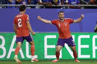 Scotland's midfielder #07 John McGinn celebrates with teammate defender #02 Aaron Hickey after scoring his team's first goal during the 2026 World Cup Group C football match between Haiti and Scotland at the Boston Stadium in Foxborough on June 13, 2026. (Photo by FRANCK FIFE / AFP)<!-- NICAID(16305923) -->