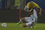 Brazil's Neymar (top) falls over Argentina's Leandro Paredes during the Conmebol 2021 Copa America football tournament final match at Maracana Stadium in Rio de Janeiro, Brazil, on July 10, 2021. (Photo by CARL DE SOUZA / AFP)<!-- NICAID(14831638) -->