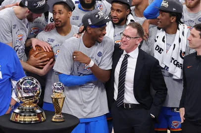 OKLAHOMA CITY, OK - MAY 28: Shai Gilgeous-Alexander #2 and General Manager Sam Presti of the Oklahoma City Thunder celebrate after winning the Western Conference Championship against the Minnesota Timberwolves during Game 5 of the 2025 NBA Western Conference Finals on May 28, 2025 at Paycom Center in Oklahoma City, Oklahoma. NOTE TO :  expressly acknowledges and agrees that, by ing and or using this photograph,  is consenting to the  and conditions of the Getty Images License Agreement. Mandatory Copyright Notice: Copyright 2025 NBAE   David Sherman/NBAE via Getty Images/AFP (Photo by David Sherman / NBAE / Getty Images / Getty Images via AFP)<!-- NICAID(16051530) -->
