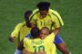 WC2002-MATCH10Brazil's Ronaldo is congratulated by teammates Rivaldo (#10) and Ronaldinho (top#11) after scoring a 50th minute equalizer against Turkey, 03 June 2002 in Ulsan's Munsu Football Stadium, during Group C action between Brazil and Turkey in the 2002 FIFA World Cup.  AFP PHOTO / PASCAL GUYOT (Photo by PASCAL GUYOT / AFP)Editoria: SPOLocal: UlsanIndexador: PASCAL GUYOTSecao: soccerFonte: AFP<!-- NICAID(15131381) -->