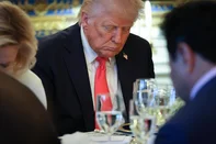 WASHINGTON, DC - APRIL 16: U.S. President Donald Trump bows his head in prayer after delivering remarks during an Easter Prayer Service and Dinner in the Blue Room of the White House on April 16, 2025 in Washington, DC. Christians across the globe will celebrate Easter on Sunday, April 20.   Win McNamee/Getty Images/AFP (Photo by WIN MCNAMEE / GETTY IMAGES NORTH AMERICA / Getty Images via AFP)<!-- NICAID(16018868) -->