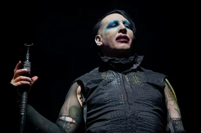 (FILES) In this file photo Marilyn Manson performs during the Astroworld Festival at NRG Stadium on November 9, 2019 in Houston, Texas - "Westworld" star Evan Rachel Wood on February 1, 2021 accused industrial rock icon Marilyn Manson of being a "dangerous man" who subjected her to years of abuse starting when she was a teenager.  The American actress, who began working in entertainment as a child, has in the past alleged abuse by an ex-partner whom she kept anonymous, but on Monday identified her abuser as "Brian Warner, also known to the world as Marilyn Manson." (Photo by SUZANNE CORDEIRO / AFP)<!-- NICAID(14704416) -->