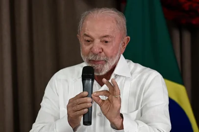 Brazil's President and re-election candidate for the Workers' Party (PT) Luiz Inacio Lula da Silva speaks during a meeting with political allies to discuss strategies for the presidential election runoff in Brasilia on October 5, 2026. Right-wing senator Flavio Bolsonaro pulled off a surprise first-place finish ahead of President Luiz Inacio Lula da Silva in the election on October 4, 2026, which heads to a run-off in three weeks as neither clinched a majority. (Photo by Evaristo Sa / AFP)<!-- NICAID(16381691) -->