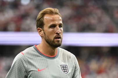 England's forward #09 Harry Kane walks on the pitch during warm up prior to the  2026 World Cup Group L football match between England and Croatia at the Dallas Stadium in Arlington on June 17, 2026.  (Photo by Paul ELLIS / AFP)<!-- NICAID(16308639) -->