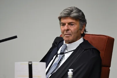 Brazil's Supreme Court Justice Luiz Fux attends the first session to deliver the verdict in the trial against former Brazilian President Jair Bolsonaro and seven main co-defendants at the Federal Supreme Court (STF) in Brasilia on September 2, 2025. Brazil's Supreme Court on Tuesday began verdict deliberations in the trial of former president Jair Bolsonaro, who is accused of plotting a coup to attempt to retain power after he lost the 2022 election. (Photo by Evaristo Sa / AFP)Editoria: POLLocal: BrasíliaIndexador: EVARISTO SASecao: trialsFonte: AFPFotógrafo: STF<!-- NICAID(16115219) -->