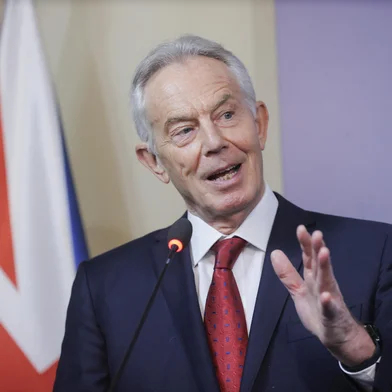 (FILES) Former British prime minister Tony Blair gestures as he speaks during a press conference with Kosovo President following their meeting in Pristina on June 10, 2024. Britain's government Monday, September 29, threw its weight behind US President Donald Trump's new plan to end the war in Gaza after it was presented to Israel and Palestinian militant group Hamas. "We strongly support his efforts to end the fighting, release the hostages and ensure the provision of urgent humanitarian assistance for the people of Gaza. This is our top priority and should happen immediately," Prime Minister Keir Starmer's office said in a statement. (Photo by AFP)<!-- NICAID(16136447) -->