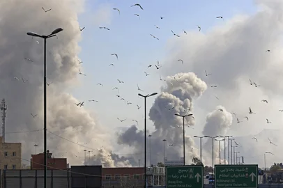 A plume of smoke rises after a strike on the Iranian capital of Tehran on March 5, 2026. Israel pounded Tehran with fresh strikes and Iran targeted Kurdish guerilla groups in Iraq on March 5 as a spiralling war in the Middle East engulfed the entire region. (Photo by Atta KENARE / AFP)<!-- NICAID(16238964) -->