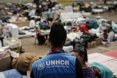 Sao Leopoldo, RS, Brasil, 21-05-2024: Integrantes do ACNUR, a agencia da ONU para refugiados, atuam em abrigo em Sao Leopoldo. Eles estao em missao no Rio Grande do Sul em apoio a abrigados e refugiados atingidos pela enchente. Foto: Mateus Bruxel / Agencia RBSIndexador: Mateus Bruxel<!-- NICAID(15769479) -->