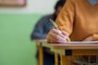 Students taking exam in classroom. Education test and literacy concept. Cropped shot, hand detail. Estudantes estudando em sala de aula - Foto: andreaobzerova/stock.adobe.comIndexador: Andrea ObzerovaFonte: 197909091<!-- NICAID(15421224) -->