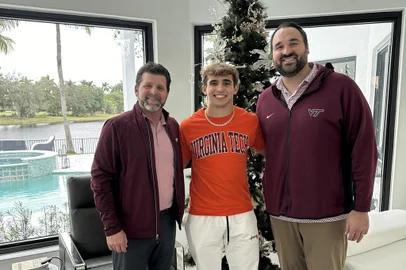 Davi Belfort ao lado dos técnicos de Virginia Tech<!-- NICAID(15631156) -->