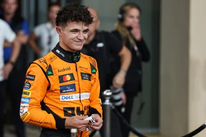 McLaren's British driver Lando Norris reacts after claiming pole position at the end of the qualifying session ahead of the Abu Dhabi Formula One Grand Prix at the Yas Marina Circuit in Abu Dhabi on December 7, 2024.HAMAD I MOHAMMED / POOL / AFP