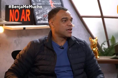 Ex-jogador e apresentador Denílson em participação no podcast Benja Me Mucho, do jornalista Benjamin Back. Ele comentou a dívida de Belo com ele no episódio.<!-- NICAID(15458073) -->