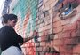 Grupo de grafiteiros colore muro de quase 90 metros no bairro Floresta, em Caxias do Sul