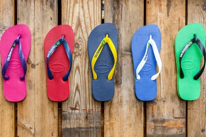 London, UK - September 1, 2017 - Flip flops in various colours on display at Camden Town<!-- NICAID(16106623) -->