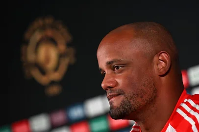 Bayern Munich's Belgian coach Vincent Kompany looks on during a press conference at the Bank of America stadium in Charlotte, North Carolina, on June 23, 2025, on the eve of the FIFA Club World Cup 2025 Group C football match between Portugal's Benfica and Germany's Bayern Munich. (Photo by Paul ELLIS / AFP)<!-- NICAID(16066755) -->